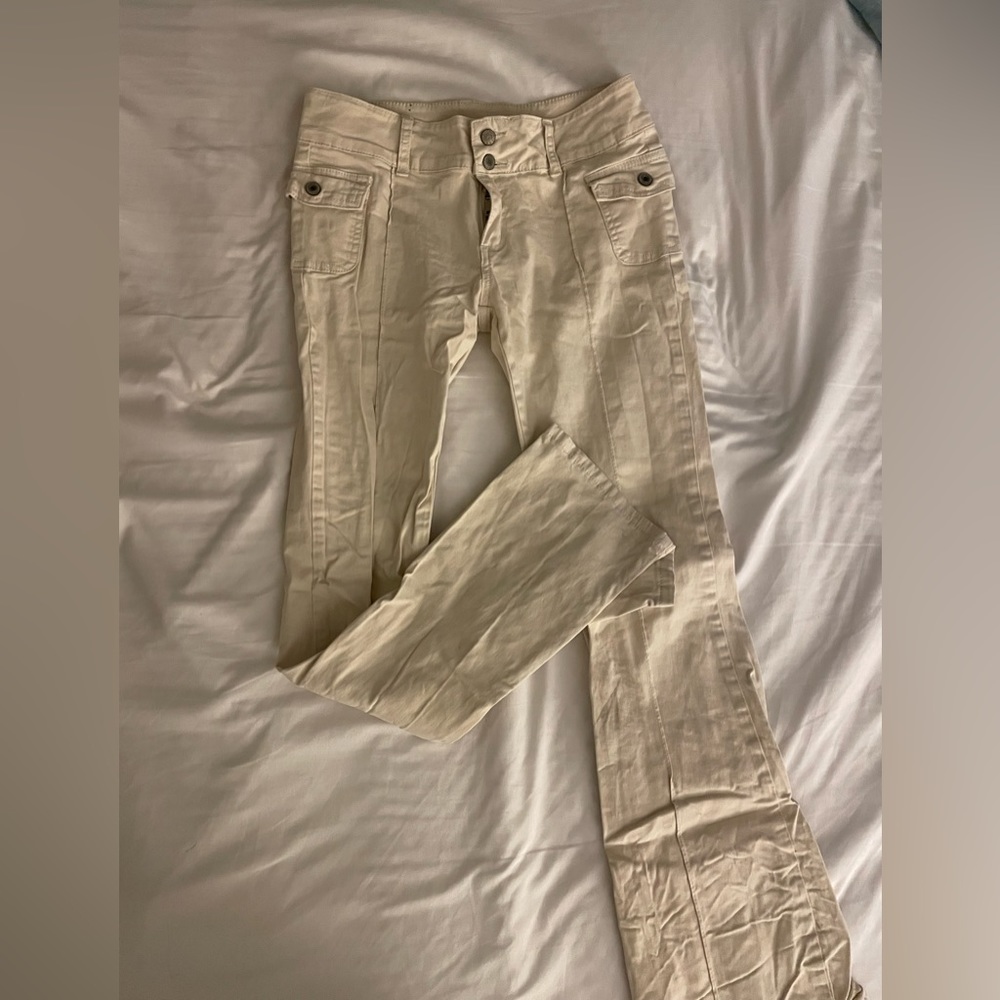 Cream colored low rise brandy melville pants.
